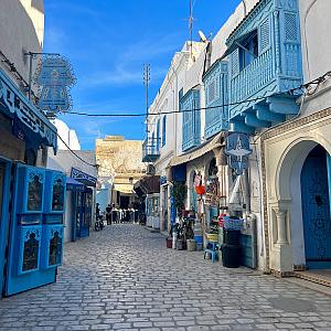 Farah Tolu-Honary’s view of a beautiful blue street in Tunesia.